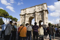 Tourists around the triumphal Arch of Constantine outside the ColosseumEuropean Italia Italian Roma Southern Europe History Holidaymakers Tourism