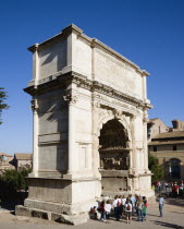 Tourists around the 19th Century reconstruction of the triumphal Arch of Titus in the ForumEuropean Italia Italian Roma Southern Europe Gray History Holidaymakers Tourism Grey