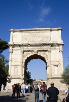 Tourists around the 19th Century reconstruction of the triumphal Arch of Titus in the ForumEuropean Italia Italian Roma Southern Europe Gray History Holidaymakers Tourism Grey