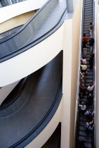 Vatican City Spiral ramp and escalator moving up with visitors at the entrance to the MuseumEuropean Italia Italian Roma Southern Europe Catholic Principality Citta del Vaticano Gray Holidaymakers Le...