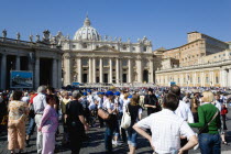 Vatican City Pilgrims in St Peters Square for the wednesday Papal Audience in front of the BasilicaEuropean Italia Italian Roma Southern Europe Catholic Principality Citta del Vaticano Holidaymakers...