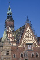 Wroclaw Town Hall dating from the fourteenth century.  Part view of exterior with decorative gable and brickwork  astronomical clock and clock tower.Ratusz 14th c. Eastern Europe European History Pol...