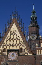 Wroclaw Town Hall dating from the fourteenth century.  Part view of exterior with decorative gable  astronomical clock and clock tower.Ratusz 14th c. Eastern Europe European History Polish Polska Bre...