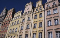 Stare Miasto.  Angled view of pastel coloured building facades in the Old Town Square.Colored Eastern Europe European Polish Polska Breslau