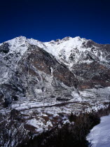 Snow covered mountain group including Tuca 2902 metres 9504 feet which is 2837 metres 9291 feet from the road towards ski village of Celer above the town of Benasque.European Scenic Southern Europe E...