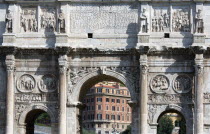 Detail of the south face of the triumphal Arch of Constantine with apartment buildings seen through the central archEuropean Italia Italian Roma Southern Europe Flat Gray History