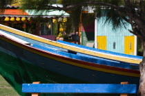 Colourful bench boat and food stalls in Mulzac Square in CliftonBeaches Resort Sand Sandy Scenic Seaside Shore Tourism West Indies Caribbean Colorful Holidaymakers Tourist Windward Islands Beaches R...