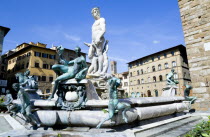 The 1575 Mannerist Neptune fountain  with the Roman sea God surrounded by water nymphs commemorating Tuscan naval victories  by Ammannatti in the Piazza della Signoria beside the Palazzo VecchioEurop...