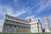 The Campo dei Miracoli or Field of Miracles.The Duomo Cathedral the Leaning Tower or Torre Pendente belltower with tourists under a blue skyEuropean Italia Italian Southern Europe Toscana Tuscan Hist...