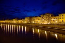 Buildings along the Arno river illuminated at dusk with street lights reflected in the waterEuropean Italia Italian Southern Europe Toscana Tuscan