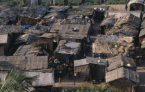 View over slum dwellings near the Sonargoan Hotel.shanty town poor poverty homes houses huts Asia Asian Bangladeshi Dacca Ecology Entorno Environmental Environnement Green Issues  shanty town poor p...