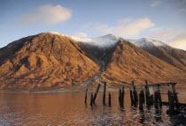 Disused jetty with snowy mountains  Ben Starav Alba Great Britain Northern Europe UK United Kingdom British Isles European  Alba Great Britain Northern Europe UK United Kingdom British Isles Europea...