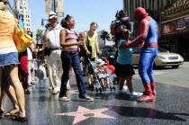 Action heroes along Hollywood BoulevardHollywood American Destination Destinations North America Northern United States of America Holidaymakers LA Performance The Golden State Tourism Tourist