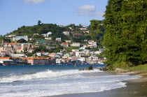 The hillside buildings and waterfront of the Carenage in the capital St Georges seen from Pandy Beach beside Port Louis Marina.Caribbean Destination Destinations Grenadian Greneda West Indies Grenada...