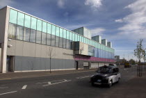 West  Falls Road  Exterior of the refurbished Falls Swimming Baths with black taxi cab passing by.ArchitectureUrbanBeal FeirsteNorthernTransportBusTaxibusPoolLeisure CentreHealthFitnessNort...