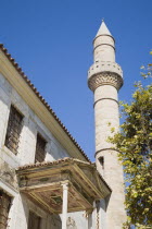 Angled part view and minaret of Jaji Hasan mosque. Greek islandsDodecaneseKosAegeanMediterraneanEuroholidayarchitectureportharboursummerseasonbluewhitesunsunshinebrightclearblue sky...