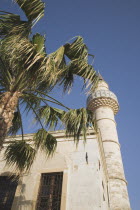 Kos Town Mosque minaret from Ottoman period when island was Turkish / Ottoman teritoryGreek IslandsResort Summer Clear Blue Sky early season Aegean DodecaneseDestination Destinations Ellada European...