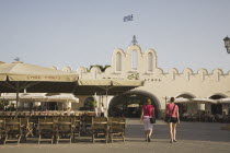 Plateia Eleftherias Kos Town Square with market entrance in background.Greek IslandsResort Summer Clear Blue Sky early season Aegean DodecaneseDestination Destinations Ellada European Greek Southern...