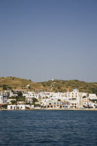 Town viewed from the sea with the blue dome of the church visible.Destination Destinations Ellada European Greek Southern Europe Salt Water Waves