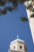 Agia Paraskevi Greek Orthodox Church  part view of tower against blue sky.Greek IslandsAegeanMediterraneanKossummerseasonholidaydestinationtraveDestination Destinations Ellada European Greek...