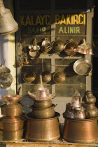 Olu Deniz.  Copper and brass-ware on sale in late afternoon sunTurkish rivieraAegeancoastcoastalOludenizresortholiday Destination Destinations European Middle East Turkiye Western Asia