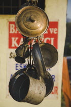 Copper and brass-ware on sale in late afternoon sun. Turkish rivieraAegeancoastcoastalOludenizresortholiday Destination Destinations European Middle East Turkiye Western Asia