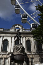 Ferris wheel next to City Hall and memorial statue for soldiers lost during the Boer War.ArchitectureIrishEuropeanIrelandEuropeUlsterBeal FeirsteNorthernMemorialStatueRiflemanFerrisWheel...