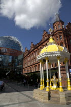 Victoria Street  Yellow and White canopied Jaffe Fountain at the entrance to the Victoria Square Shopping centre next to Bittle Bar. Fountain constructed as a memorial to Daniel Joseph Jeffe in 1874....