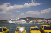 Kusadasi.  Harbour with ferry and cruise ships.  A popular stopping point for Ephesus tours in early Summer.AegeanCoast CoastalSeaHolidayResortport Destination Destinations European Holidaymaker...