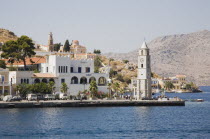 Yialos.  Waterside buildings and clocktower.AegeanGreek IslandsSimicoast coastalseaSummerpackageholidayresortvacationtripdestinationDestinations ElladaEuropeanSouthern EuropeDestinatio...