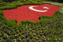 Turkey Cappadocia Ankara Anitkabir Mausoleum of Kemal Ataturk The Turkish flag as map of the country made of red and white pebblestones set amongst flowers.