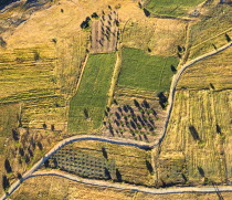 Turkey, Cappadocia, Goreme, Hot air balloons in flight over landscape, patterns seen from hot air balloon