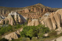 Turkey, Cappadocia, Goreme, Rose and Red Valleys, The Church of the Three Crosses sitting amidst the rocks.