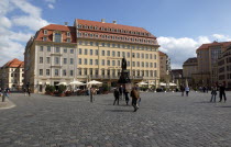 Neumarkt  tourists walking across square in front of the Steinberger Hotel de Saxe.Destination Destinations Deutschland European History Holidaymakers Sachsen Tourism Tourist Western Europe Saxony Si...