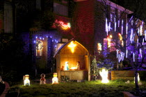 England, West Sussex, Southwick, Cul de Sac of house decorated with fairy lights for Christmas.