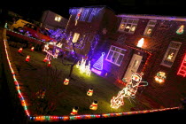 England, West Sussex, Southwick, Cul de Sac of house decorated with fairy lights for Christmas.