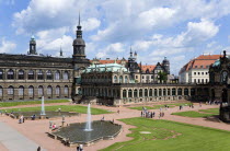 GERMANY, Saxony, Dresden, The central Courtyard of the restored Baroque Zwinger Palace gardens busy with tourists originally built between 1710 and 1732 after a design by Matthus Daniel Pppelmann in...