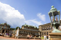 GERMANY, Saxony, Dresden, The central Courtyard of the restored Baroque Zwinger Palace gardens busy with tourists originally built between 1710 and 1732 after a design by Matthus Daniel Pppelmann in...