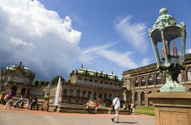 GERMANY, Saxony, Dresden, The central Courtyard of the restored Baroque Zwinger Palace gardens busy with tourists originally built between 1710 and 1732 after a design by Matthus Daniel Pppelmann in...