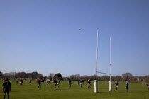 England, West Sussex, Shoreham-by-Sea, Rugby Teams playing on Victoria Park playing fields.