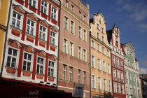 Poland, Wroclaw, pastel coloured building facades in the Rynek old town square.