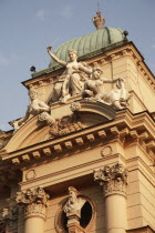 Poland, Krakow, female sculptures on the Juliusz Slowacki Theatre.