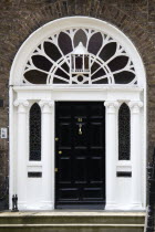 Ireland, County Dublin, Dublin City, Ornate black and white Georgian doorway in the city centre south of the Liffey River.