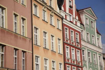 Poland, Wroclaw, pastel coloured building facades in the Rynek old town square.