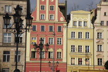 Poland, Wroclaw, pastel coloured building facades in the Rynek old town square.