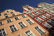 Poland, Wroclaw, pastel coloured building facades in the Rynek old town square.