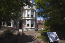 Ireland, North, Belfast, Malone Road, Orchard cafe with people sat in the garden.