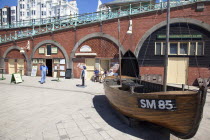 England, East Sussex, Brighton, Exterior of the fishing museum and art galleries under promenade arches.