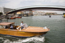 Italy, Veneto, Venice, Ponte di Calatrava Bridge, Fourth bridge across the Grand Canal opened in September 2008 linking the train station and Piazzale by Spanish architect Santiago Calatrava. Passing...