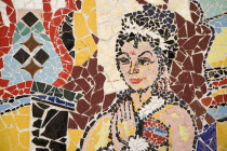 Greece, Attica, Athens, Mosaic of coloured tile pieces depicting female figure at city subway station.